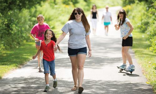 Young kids walking on the Pumpkinvine Trail