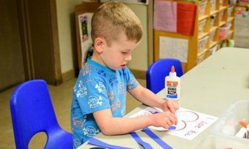 Walnut Hill student working at a table