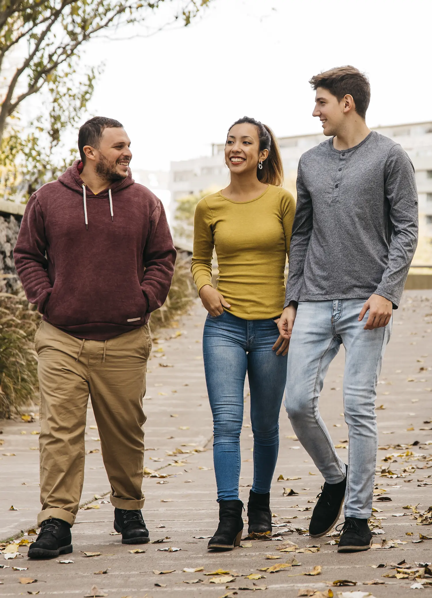 multiethnic-friends-walking-autumn copy Multiethnic College Students walking on campus